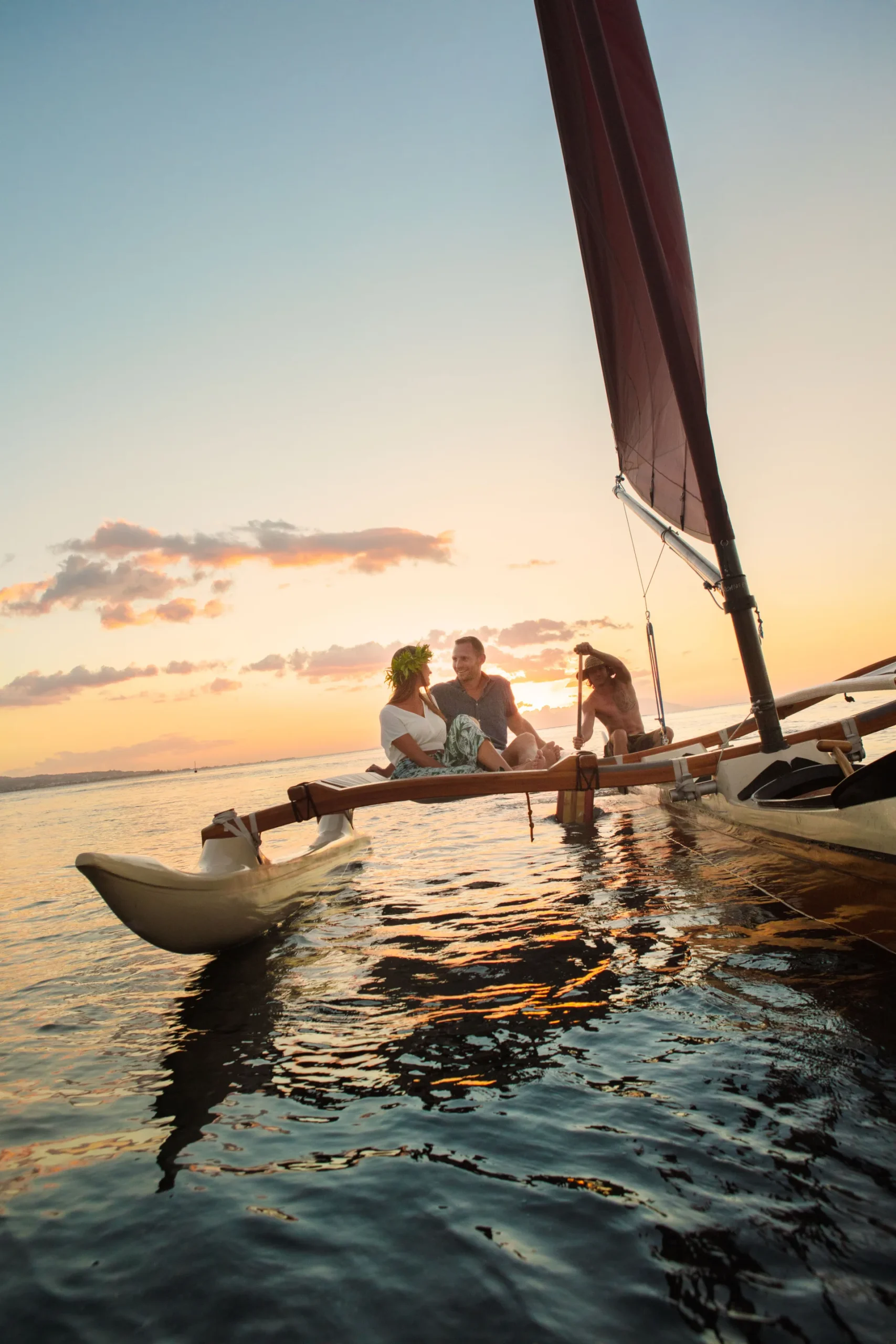 Pahi sailing canoes fushing in the lagoon of Rajatea. In the